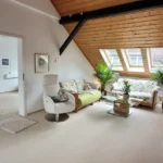 Dachgeschosswohnung Wohnzimmer 2